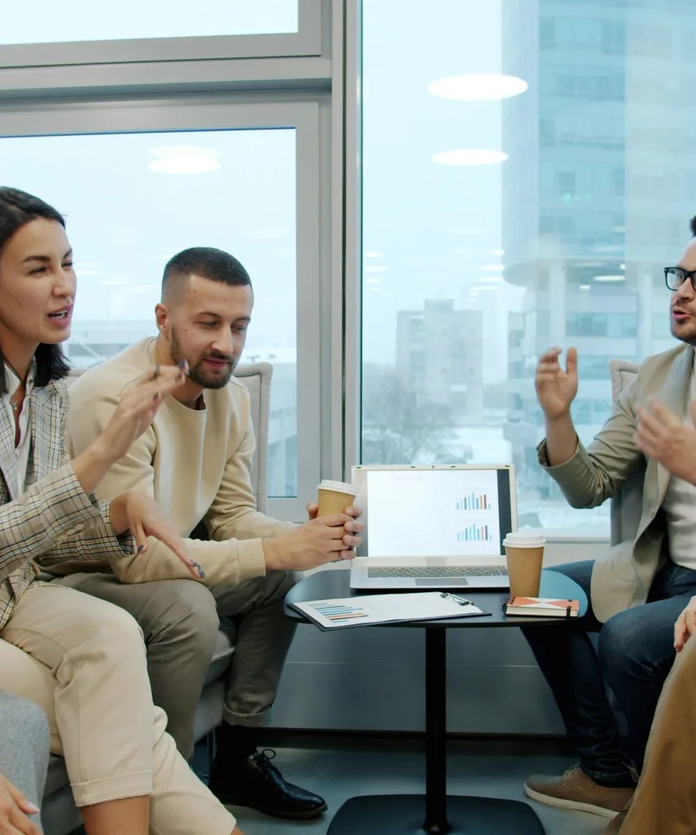 Recruitment consultant and colleagues discussing candidate opportunities